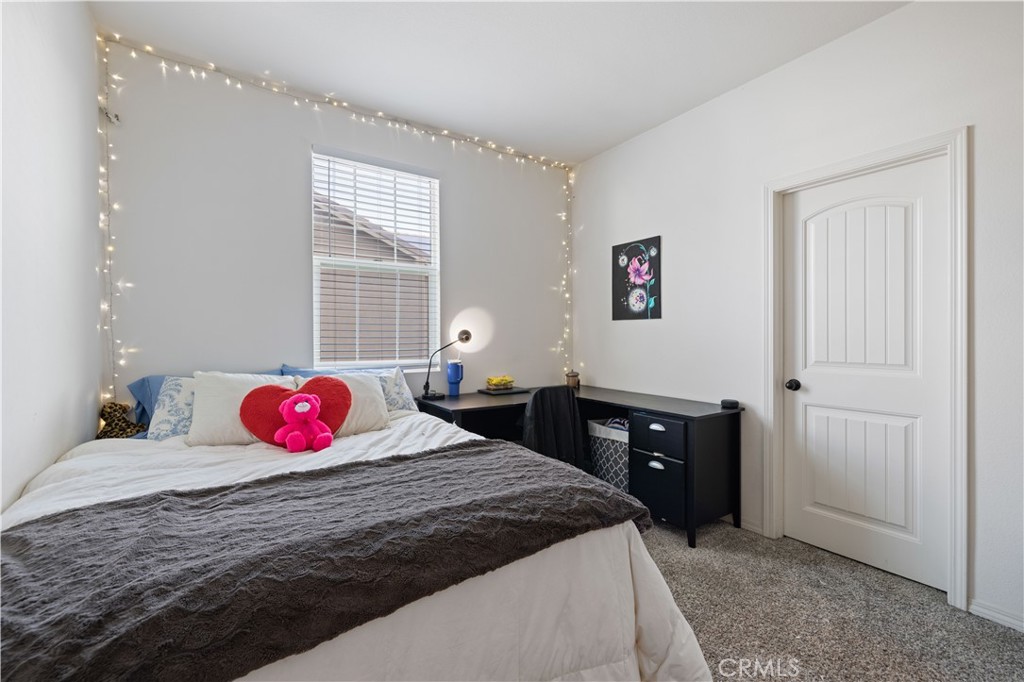 22088 Windham Way Saugus, CA 91350 - Photo 29 of 62 a bedroom with a bed and a dresser