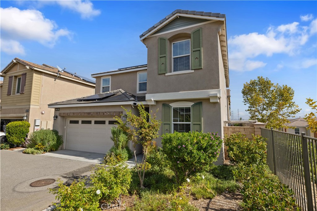 22088 Windham Way Saugus, CA 91350 - Photo 3 of 62 a front view of a house with a yard
