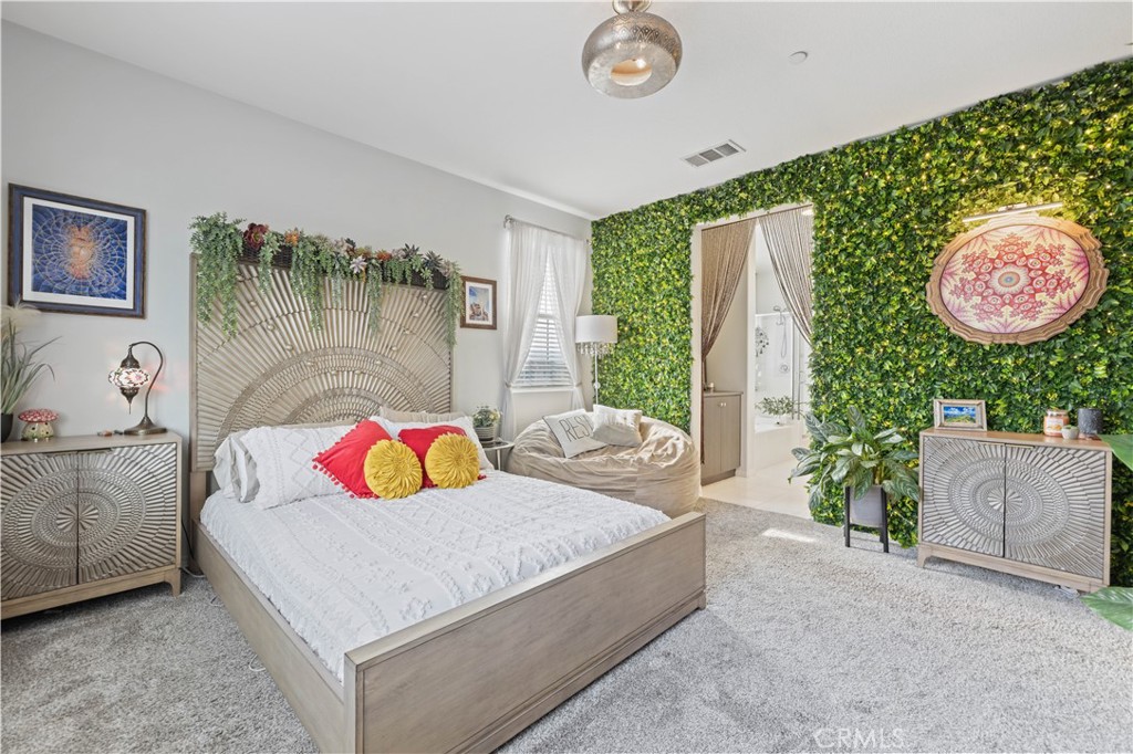 22088 Windham Way Saugus, CA 91350 - Photo 31 of 62 a bedroom with a bed and a window