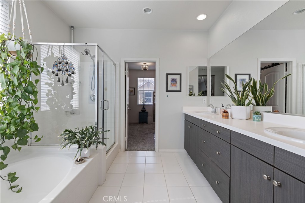 22088 Windham Way Saugus, CA 91350 - Photo 35 of 62 a bathroom with a shower and a mirror