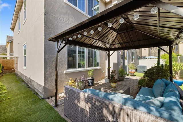 a view of a park with iron fence