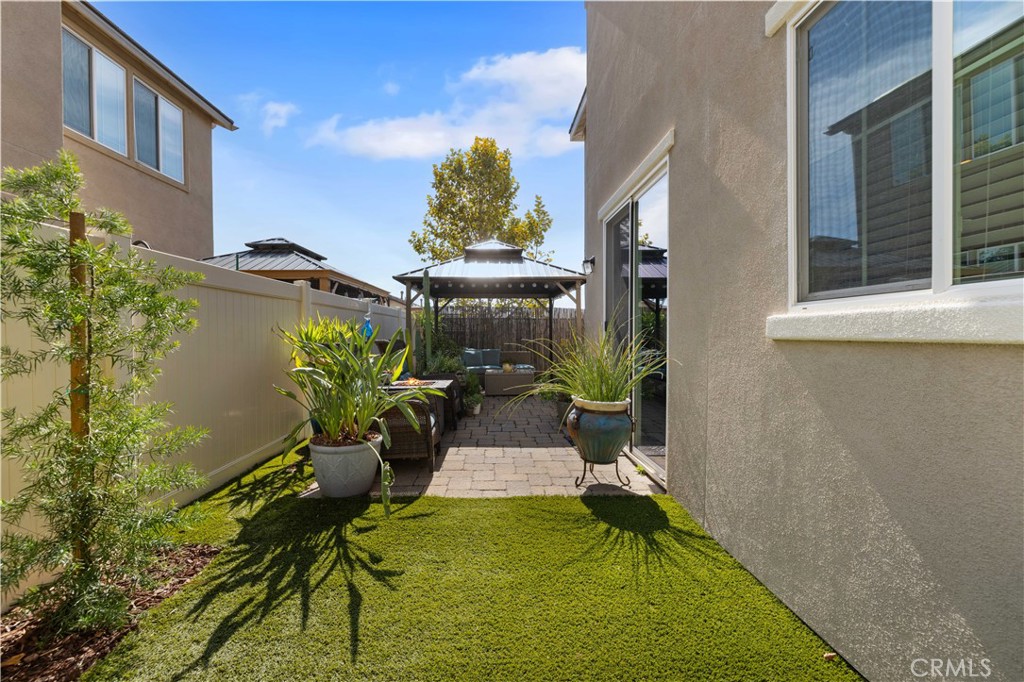 22088 Windham Way Saugus, CA 91350 - Photo 48 of 62 a view of a house with backyard and sitting area
