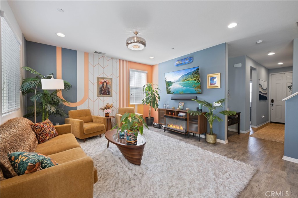 22088 Windham Way Saugus, CA 91350 - Photo 6 of 62 a living room with furniture and a flat screen tv