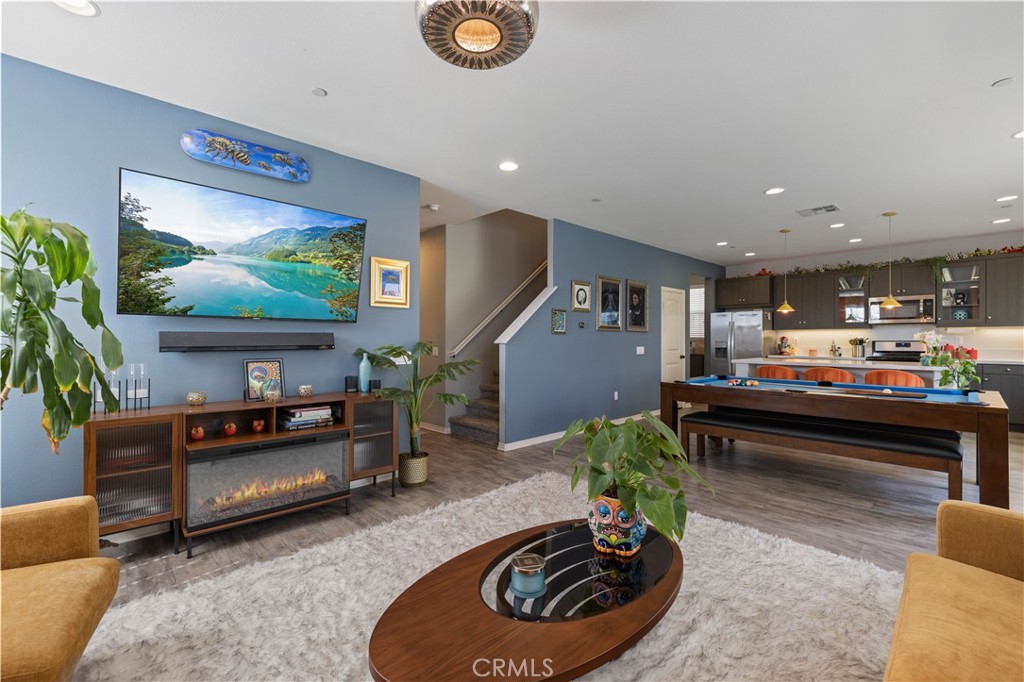 22088 Windham Way Saugus, CA 91350 - Photo 7 of 62 a living room with furniture and a flat screen tv