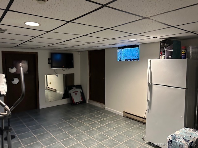 24 Colonial Drive Waterford, CT 06385 - Photo 22 of 25 a white refrigerator freezer sitting in a kitchen