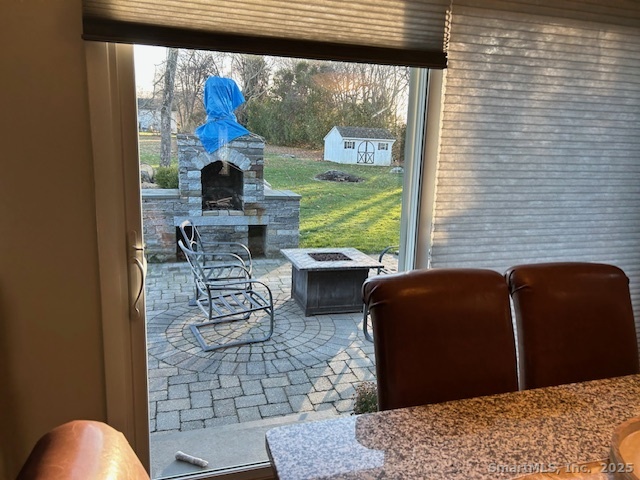 24 Colonial Drive Waterford, CT 06385 - Photo 10 of 25 a living room with furniture and a floor to ceiling window