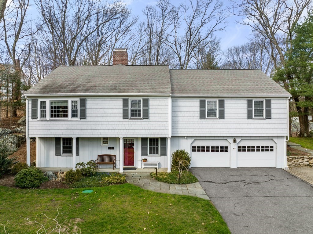 42 Bradyll Road Weston, MA 02493 - Photo 1 of 31 front view of a house with a yard