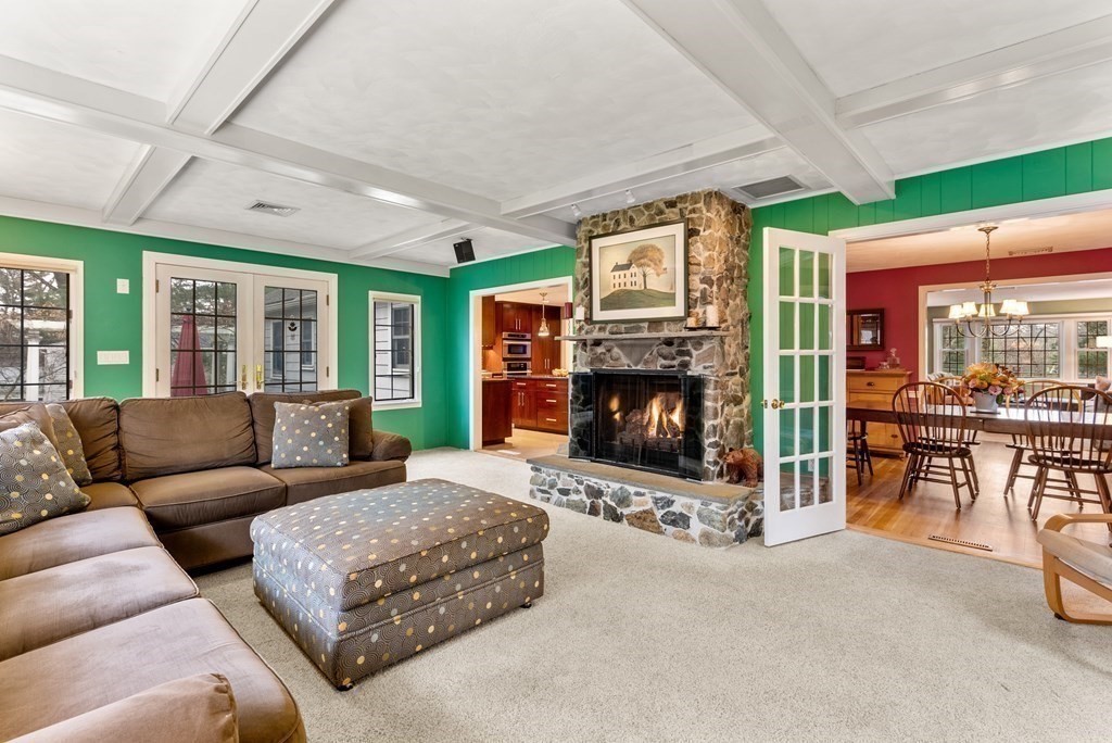 42 Bradyll Road Weston, MA 02493 - Photo 12 of 31 a living room with furniture and a fireplace