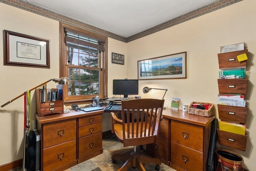 42 Bradyll Road Weston, MA 02493 - Photo 25 of 31 a room with a workspace and a window