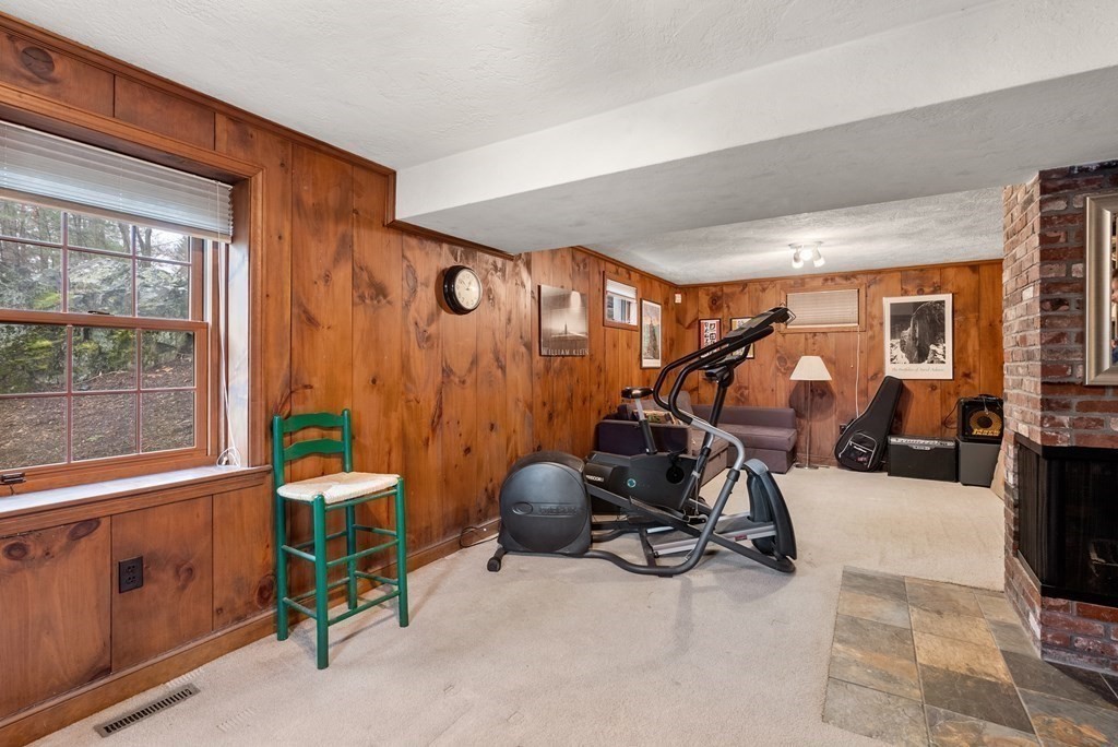 42 Bradyll Road Weston, MA 02493 - Photo 27 of 31 a view of a room with gym equipment