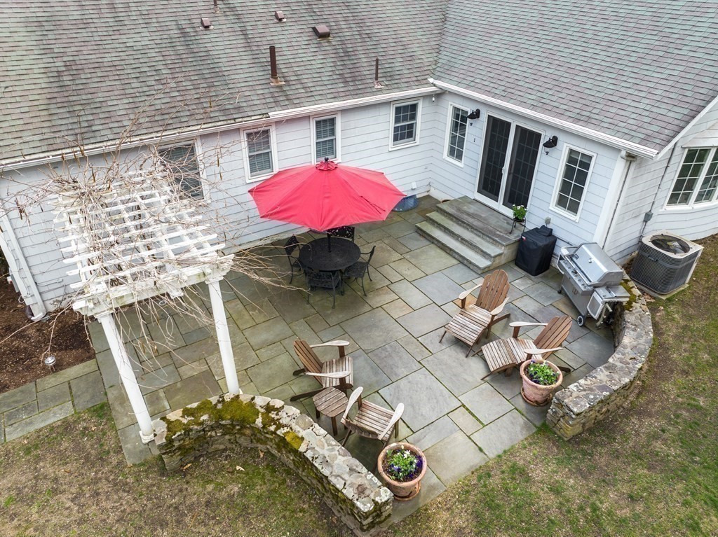42 Bradyll Road Weston, MA 02493 - Photo 30 of 31 an aerial view of a house with backyard and patio