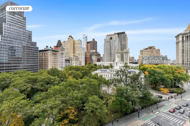 a view of a city with tall buildings