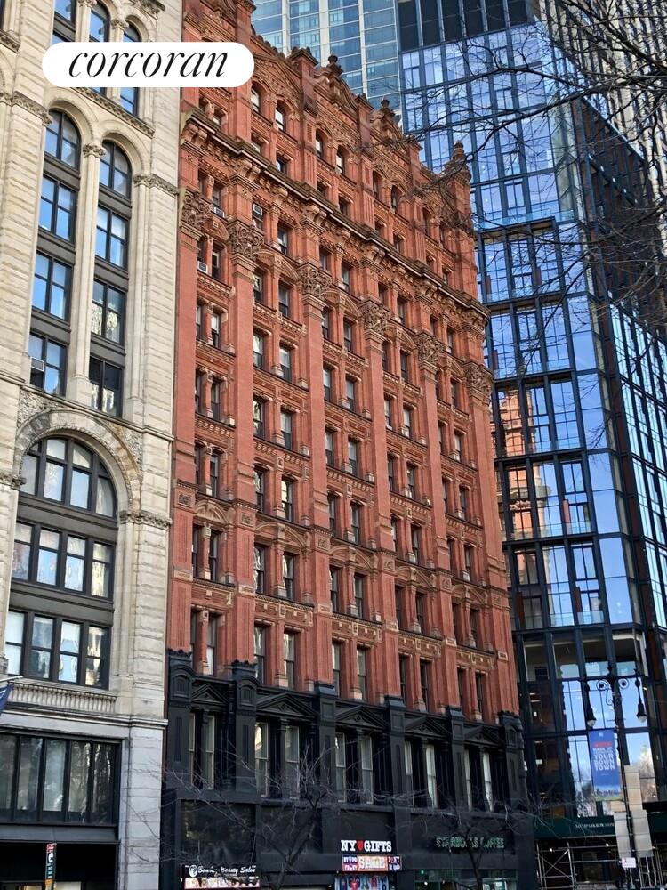 145 Nassau Street, Unit 8A Manhattan, NY 10038 - Photo 18 of 26 a front view of a building