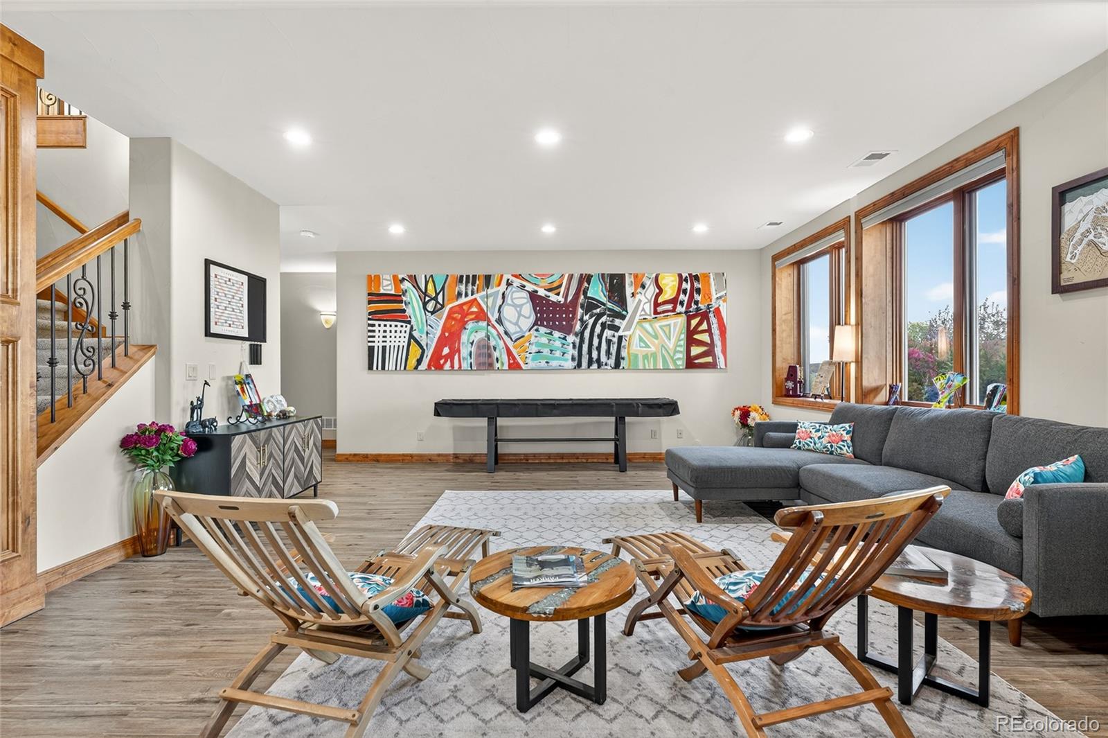 5001 Raintree Circle Parker, CO 80134 - Photo 12 of 50 a living room with furniture and a potted plant