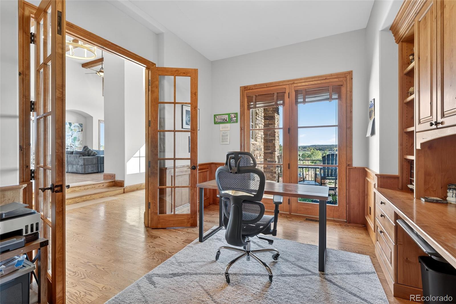 5001 Raintree Circle Parker, CO 80134 - Photo 14 of 50 a view of a livingroom with workspace and a window