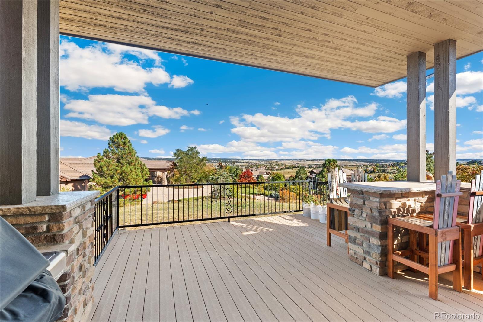 5001 Raintree Circle Parker, CO 80134 - Photo 46 of 50 a view of a balcony with furniture