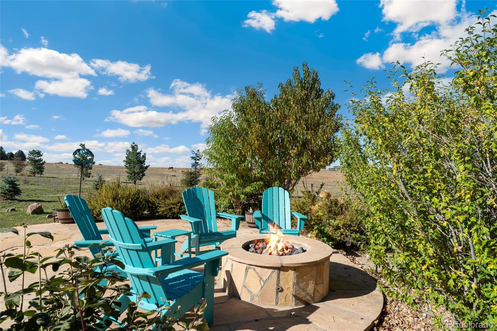 5001 Raintree Circle Parker, CO 80134 - Photo 47 of 50 a outdoor dining space with furniture and city view