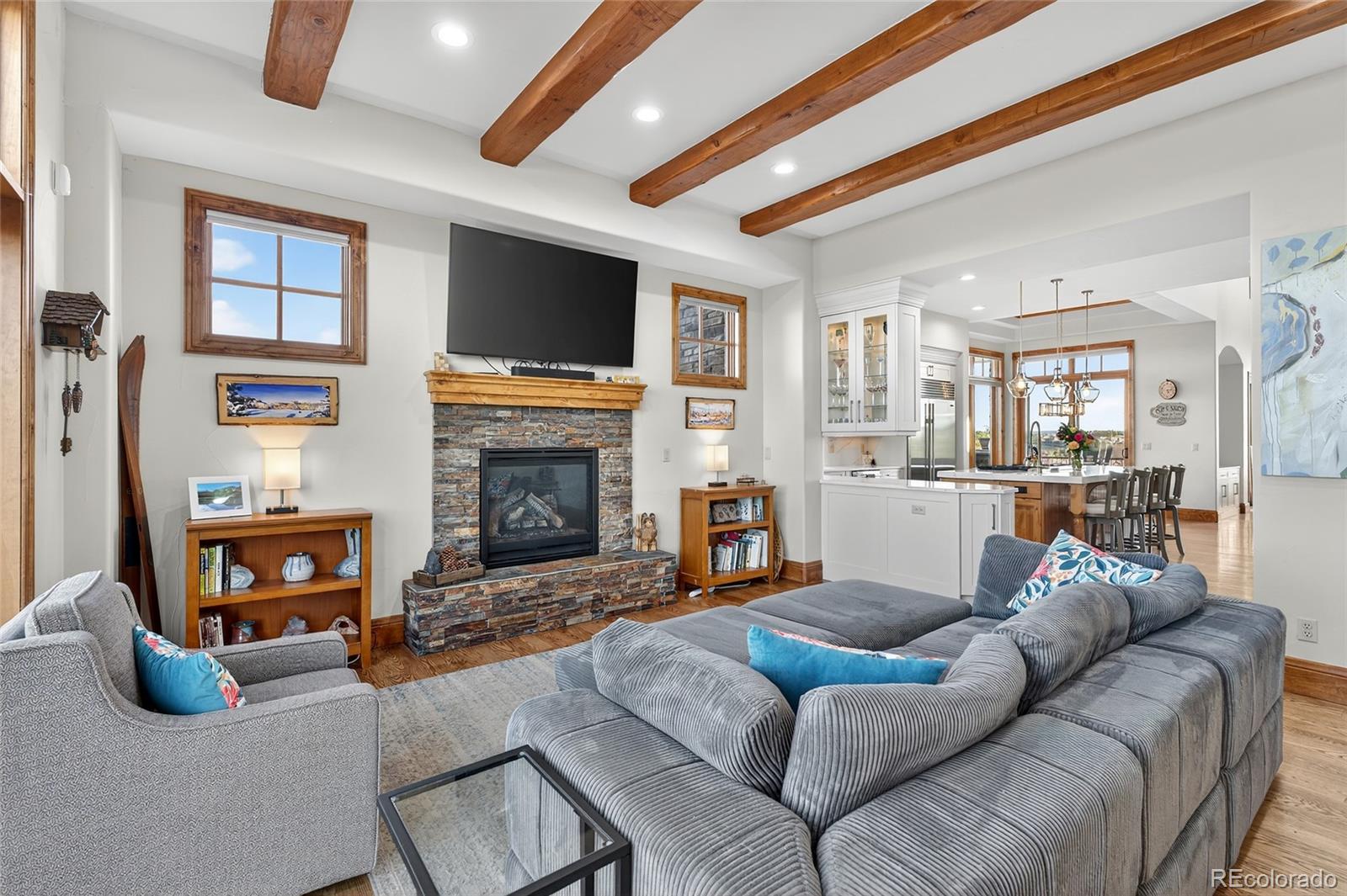5001 Raintree Circle Parker, CO 80134 - Photo 9 of 50 a living room with furniture fireplace and flat screen tv