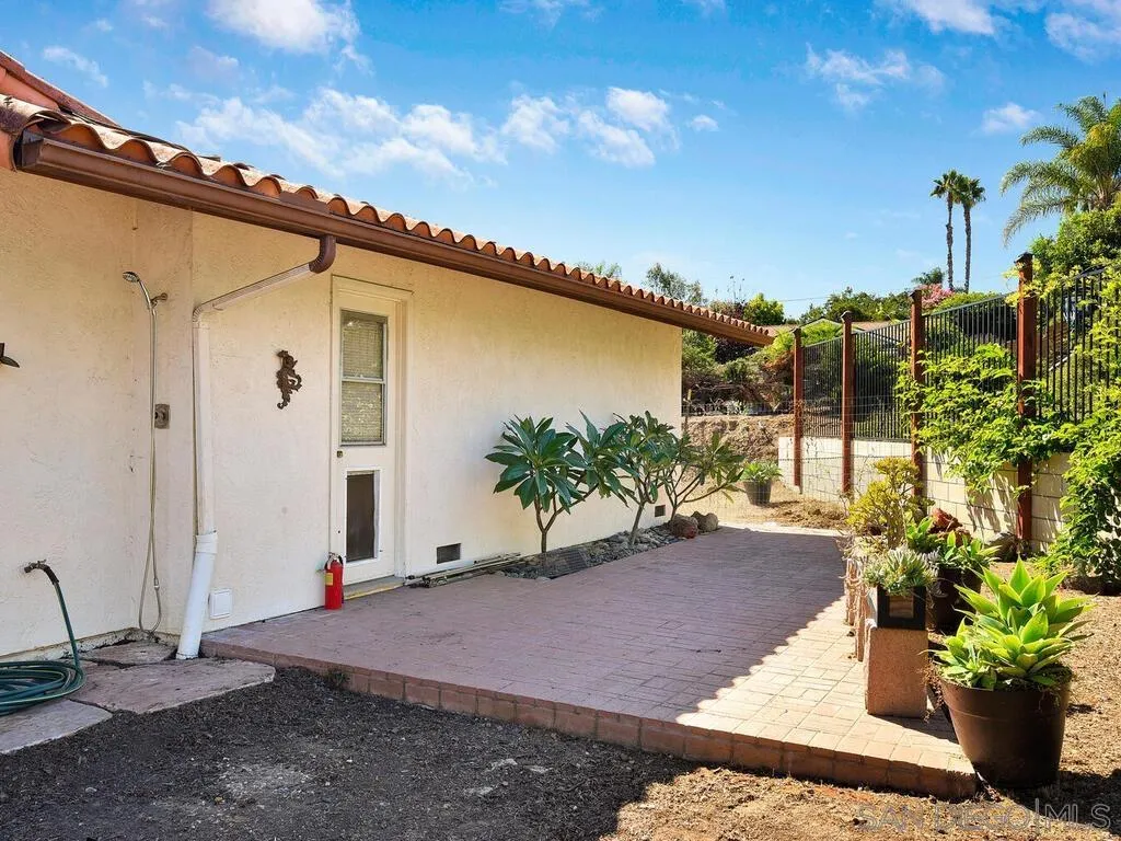 1506 Renwick Lane Vista, CA 92084 - Photo 13 of 28 a front view of a house with a yard