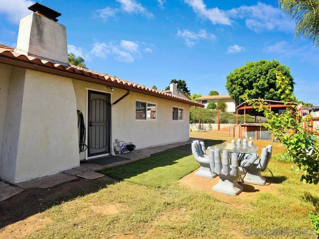 1506 Renwick Lane Vista, CA 92084 - Photo 14 of 28 a view of a backyard with sitting area