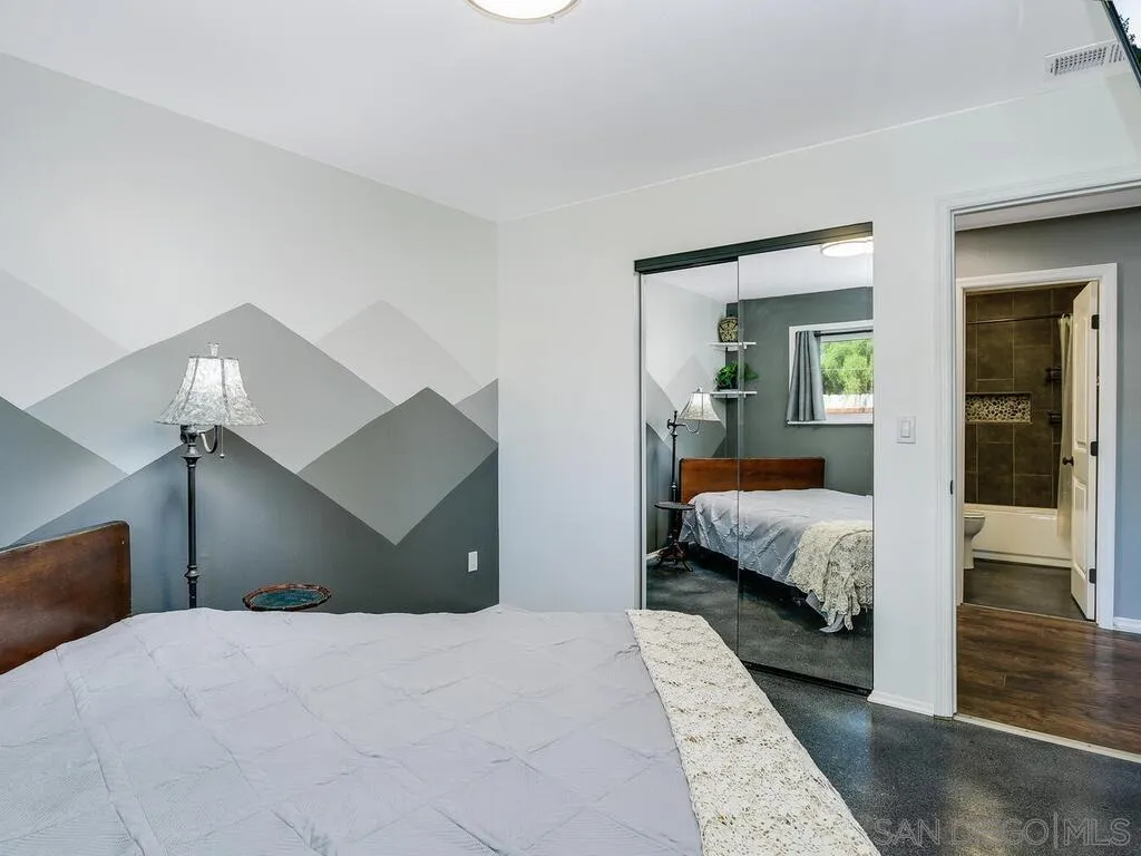 1506 Renwick Lane Vista, CA 92084 - Photo 24 of 28 a bedroom with a large bed and a view of bedroom