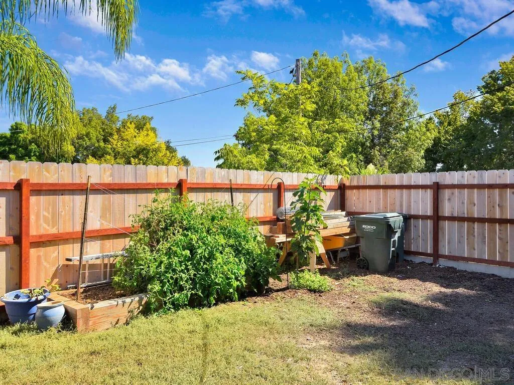 1506 Renwick Lane Vista, CA 92084 - Photo 6 of 28 a view of a backyard with plants and outdoor seating