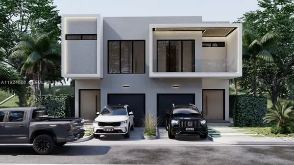 a car parked in front of a house