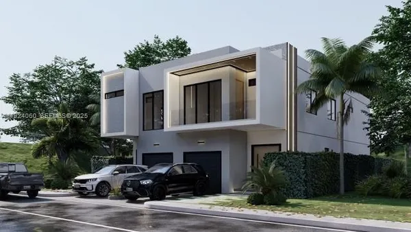 a front view of a house with a garden