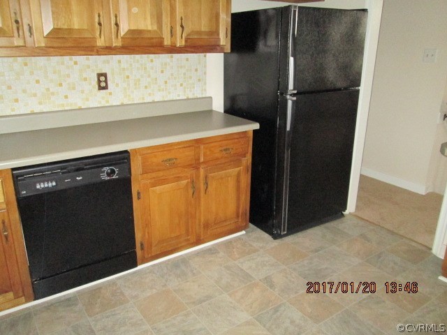 11520 Danforth Road Chesterfield, VA 23838 - Photo 3 of 17 a view of a kitchen with a refrigerator