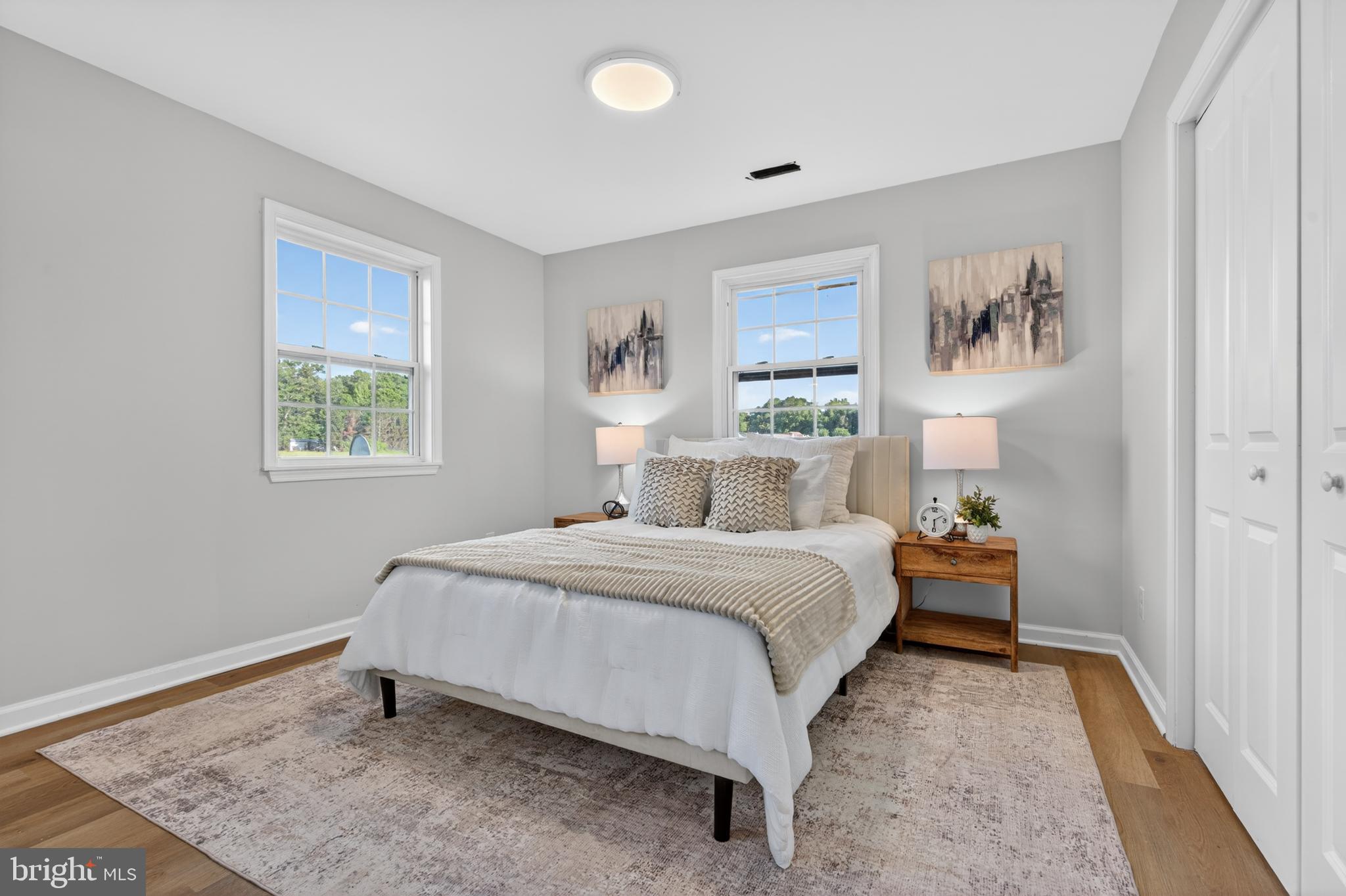 22045 Carters Gate Road Ruther Glen, VA 22546 - Photo 17 of 27 a bedroom with a bed and a window
