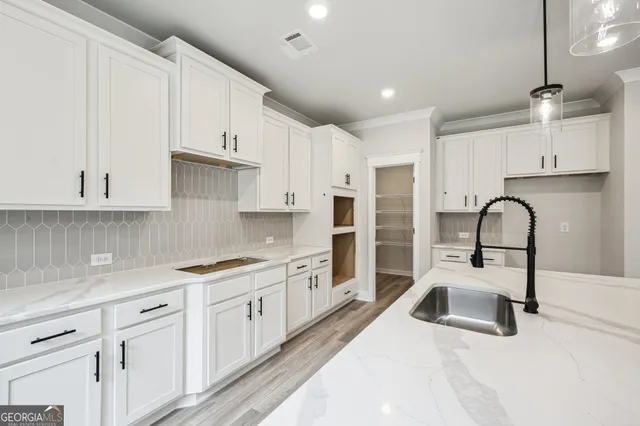 a view of a room with racks on the wall