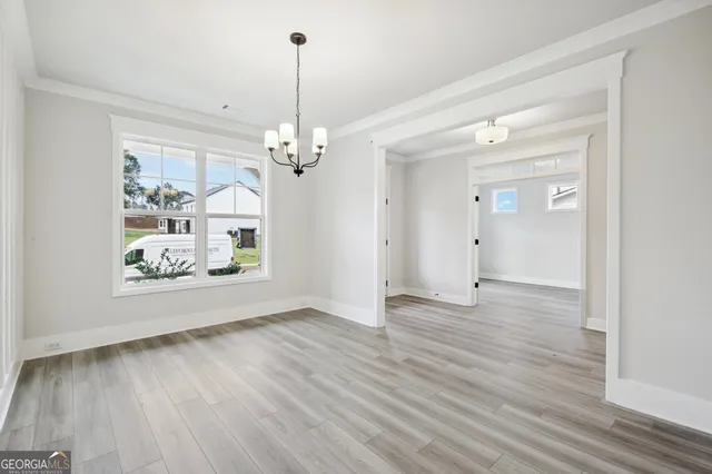 a view of a hallway with staircase