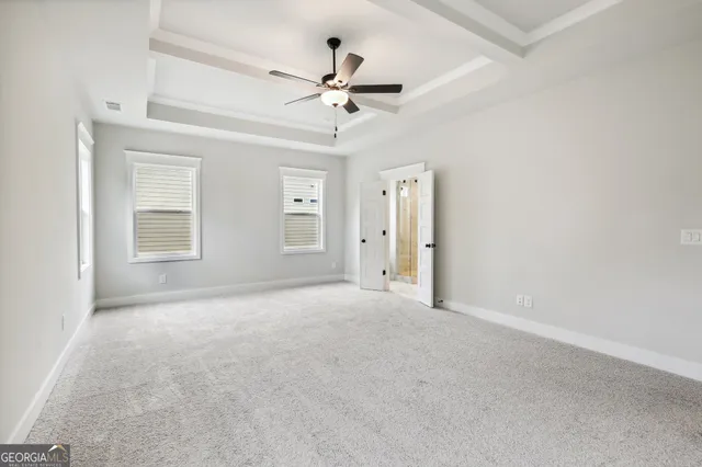 a view of a car park in front of building