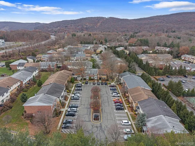 an aerial view of a city with lots of residential buildings