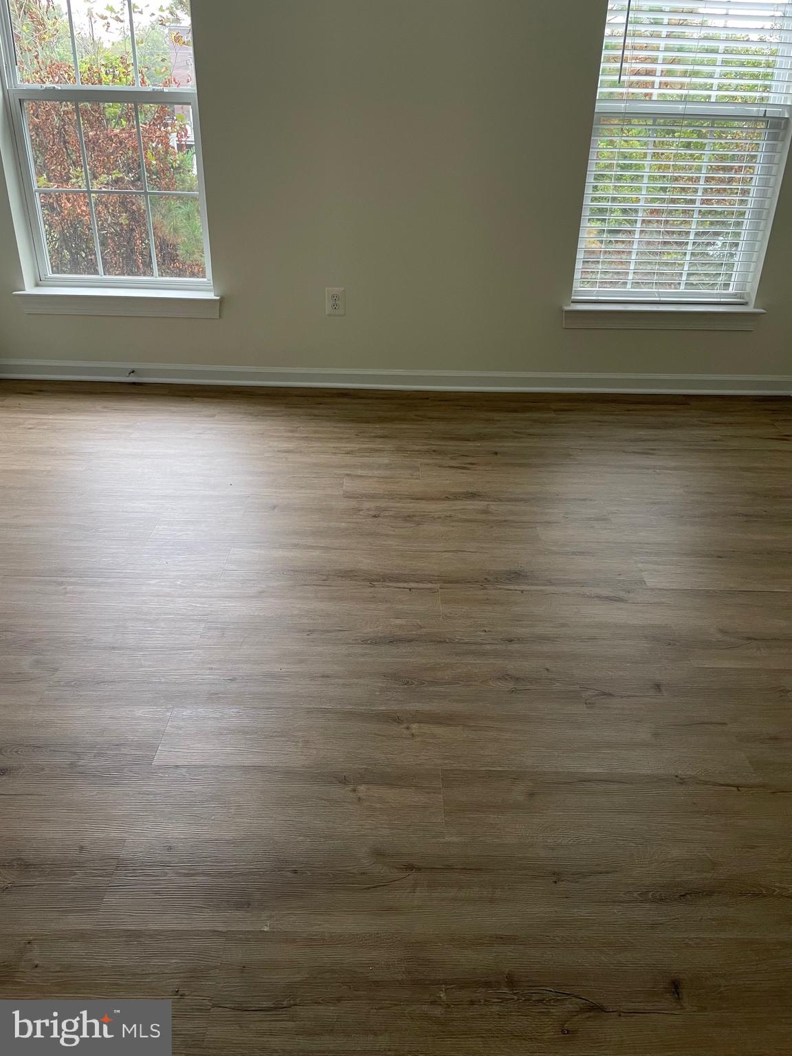 7454 Riding Meadow Way Manassas, VA 20111 - Photo 18 of 21 a view of an empty room with a window