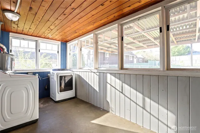 a view of a kitchen with washer and dryer