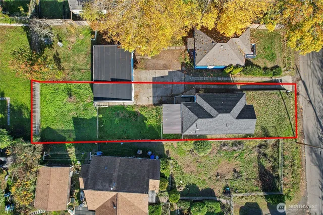 an aerial view of houses with outdoor space