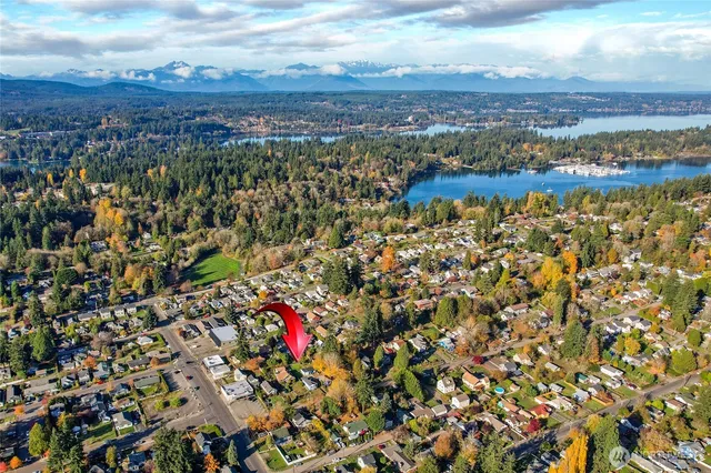 a picture of a bench in front of a wall