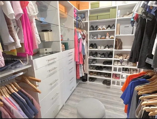 a bathroom with a sink a bathtub and a mirror