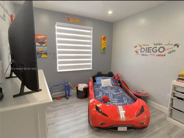 a workspace with furniture and wooden floor