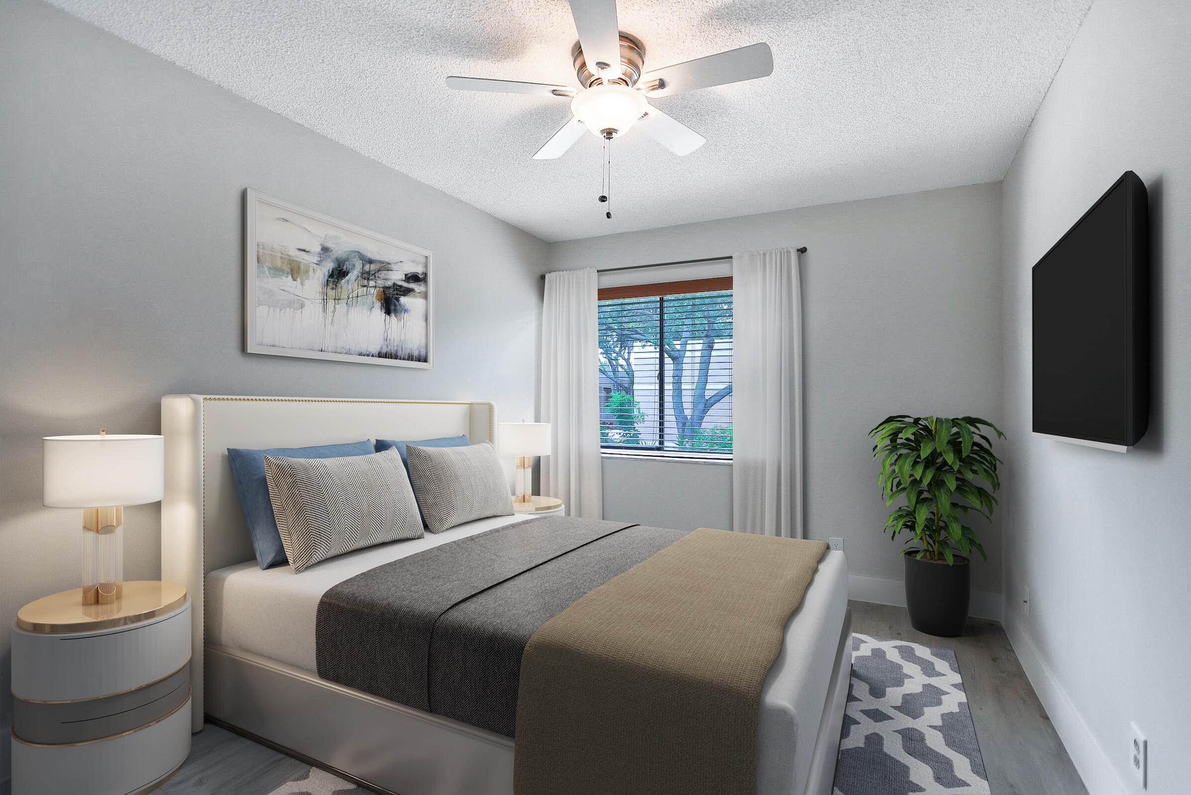 1169 Northwest 13th Street, Unit 1 Boca Raton, FL 33486 - Photo 11 of 20 a bedroom with a large bed and a chandelier