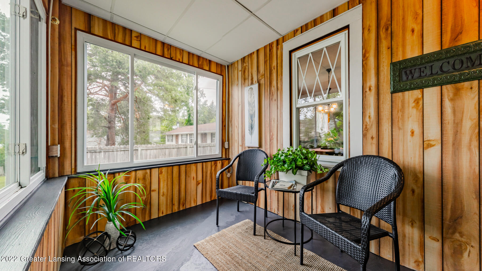 3119 North Aurelius Road Lansing, MI 48910 - Photo 5 of 31 Three season room 1