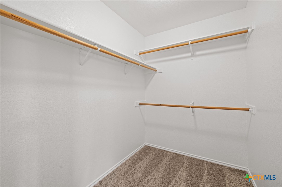 214 Timber Ridge Drive Nolanville, TX 76559 - Photo 18 of 31 a view of a room with racks on the wall