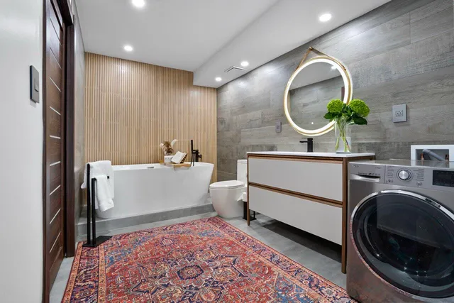 a living room with a sink and a mirror