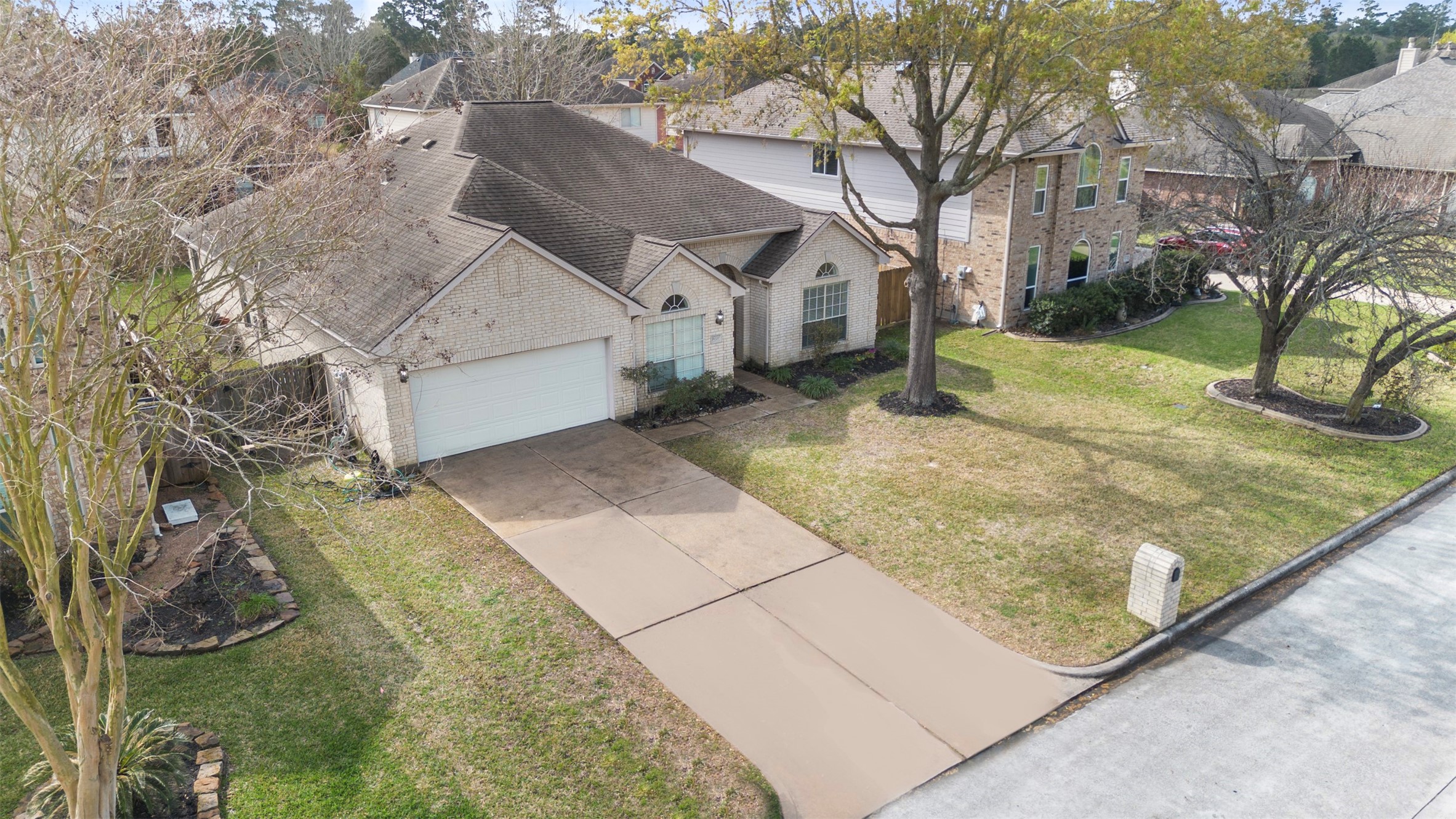 9211 Memorial Hills Drive Spring, TX 77379 - Photo 23 of 33 Double wide driveway for extra parking