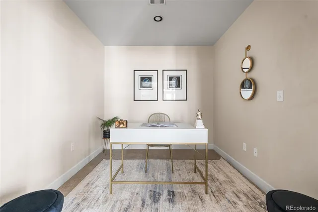 a view of a bedroom with a bed