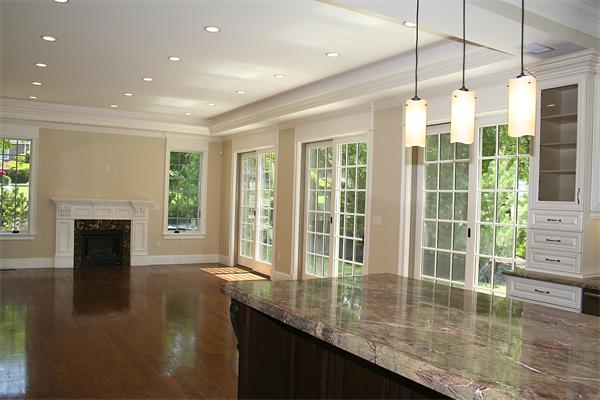 6 Deborah Road Newton, MA 02459 - Photo 5 of 29 a view of a living room and a floor to ceiling window and wooden floor