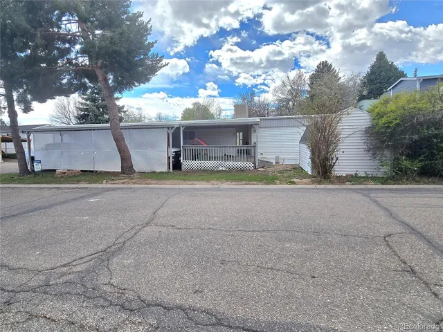 front view of a house with a street