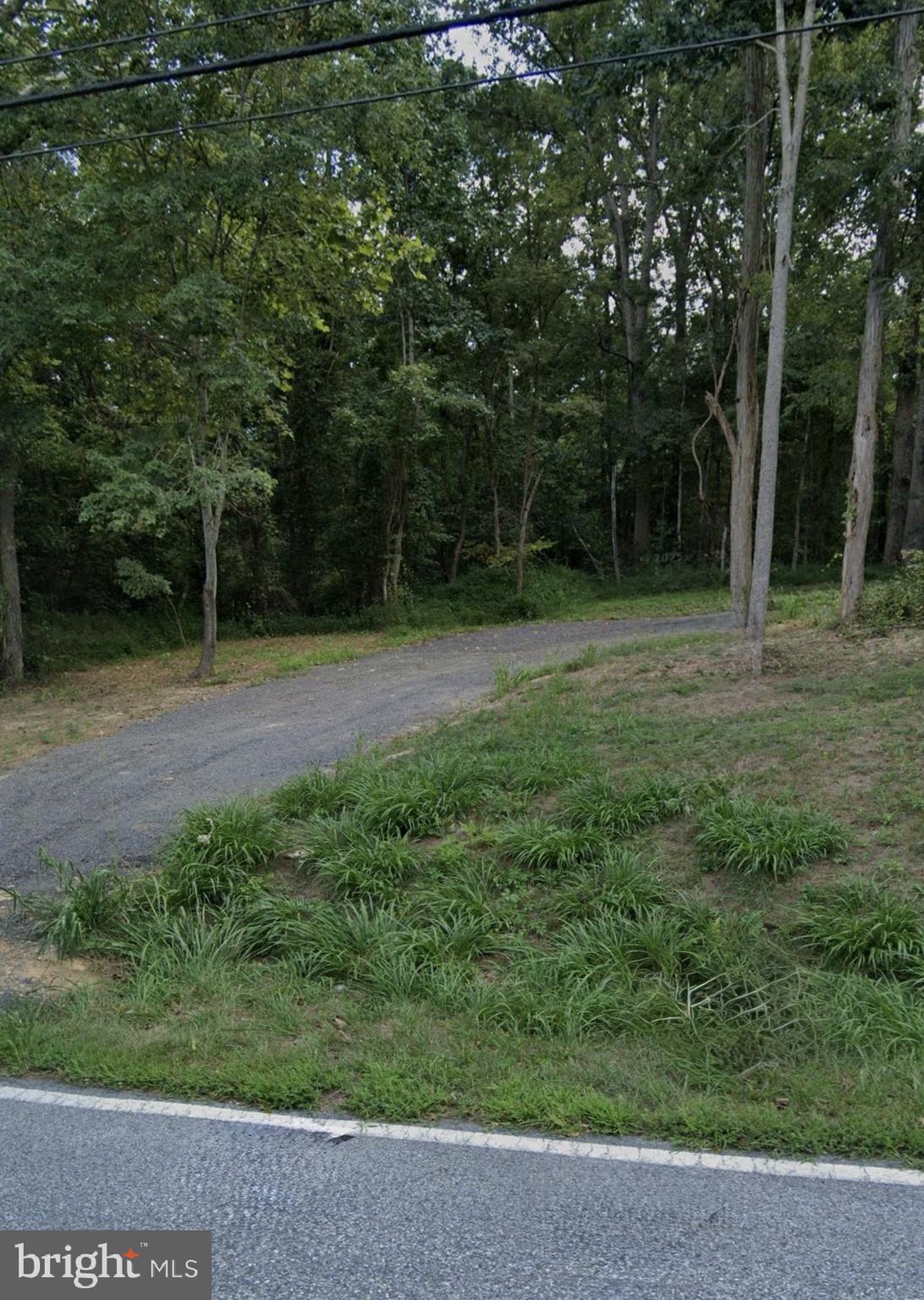 11075 Creeks Place Charlotte Hall, MD 20622 - Photo 7 of 7 a view of outdoor space with deck and yard