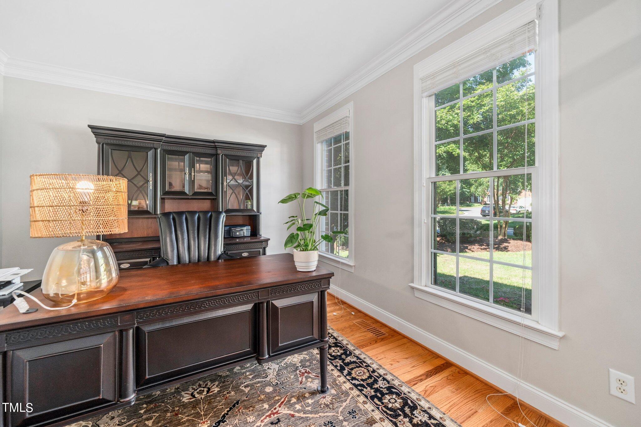 109 Chilcott Lane Apex, NC 27502 - Photo 15 of 34 a room with furniture lamp and window